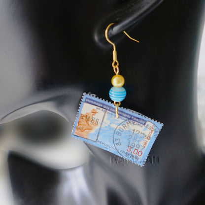 Boucle d’oreille unique en timbre vintage