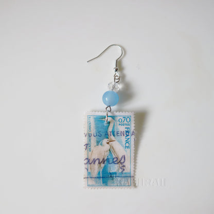 Boucle d’oreille unique en timbre vintage