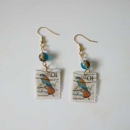 Boucles d’oreilles en timbres vintage