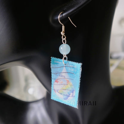 Boucle d’oreille unique en timbre vintage