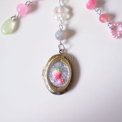 Porte-clé locket décoré à la main